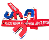 Red, White & Blue RV Airbrake Lockout Blocks with "Remove Before Flight" tag