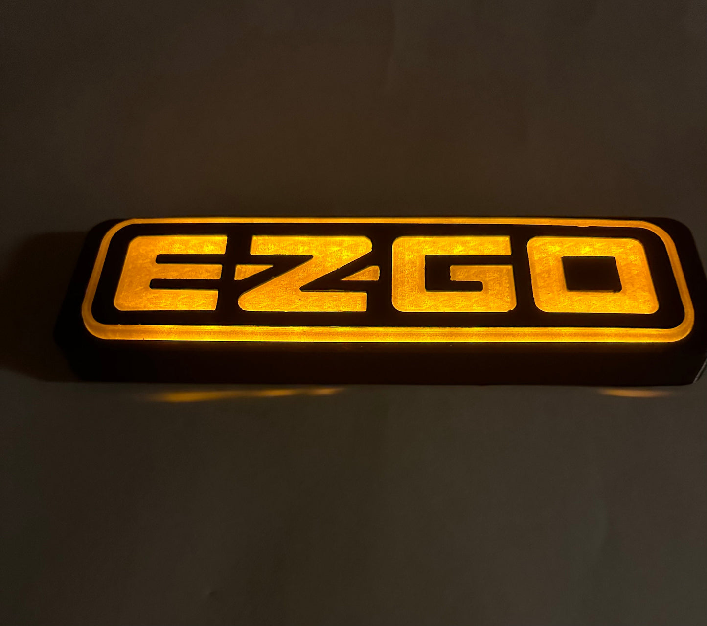 EZGO golf cart TXT,  RXV yellow led emblem, logo, nameplate, sticker