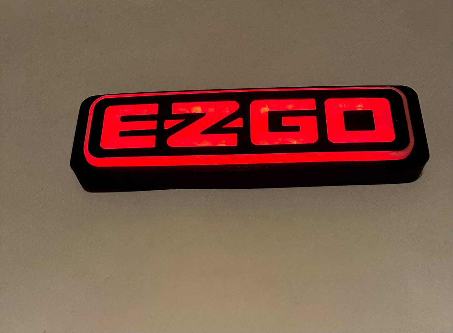 EZGO golf cart TXT,  RXV red led emblem, logo, nameplate, sticker