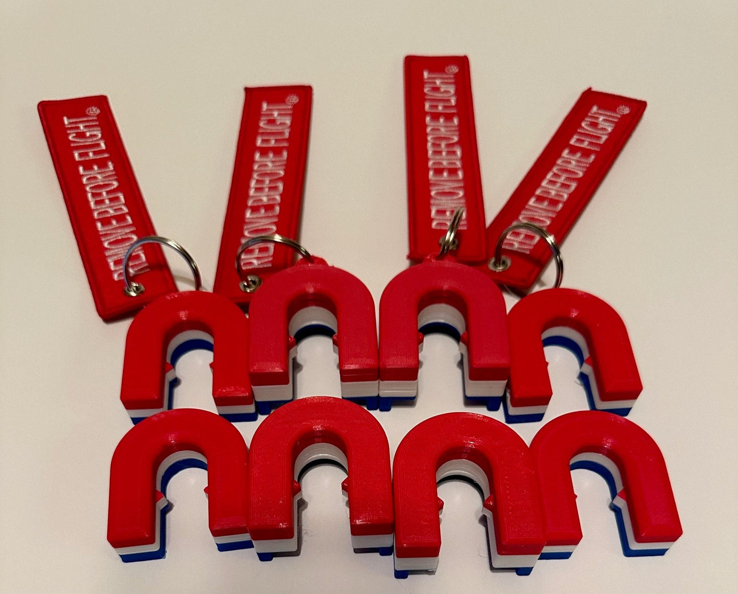 Red, White & Blue, RV Mini and Original and Airbrake Lockout Blocks with "Remove Before Flight tag."