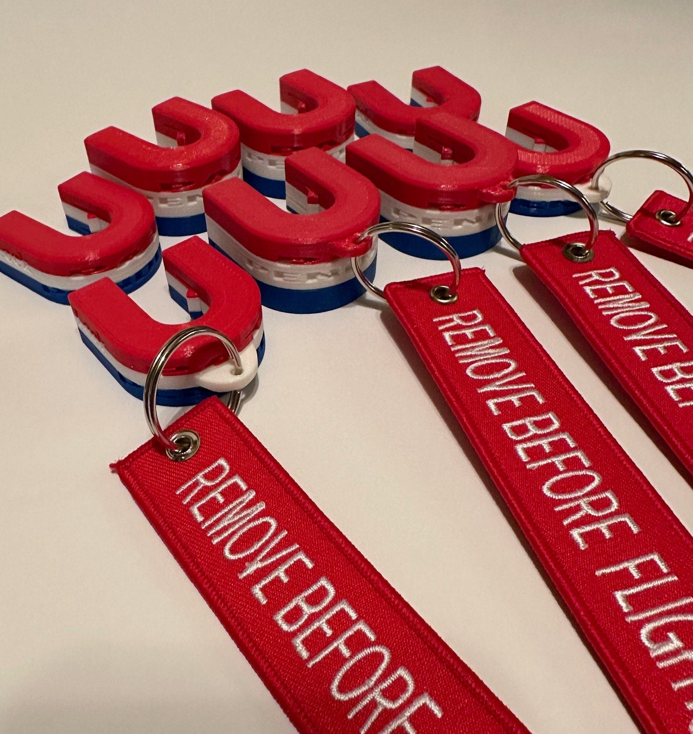 Red, White & Blue, RV Mini and Original and Airbrake Lockout Blocks with "Remove Before Flight tag."